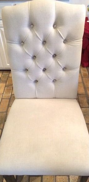 Fauteuil capitonné après